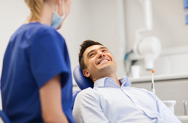 Dental sleep medicine expert speaking with a patient.