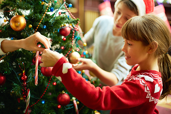 A family celebrating holiday events in their home.