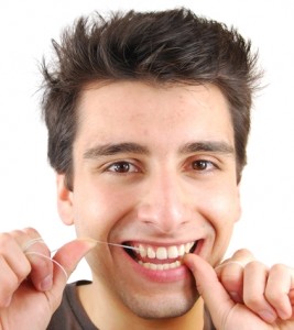 protect your enamel by flossing - 5 ways to damage tooth enamel