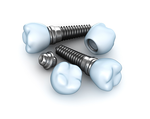 Set of dental implants on a white background.